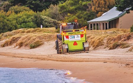 THE sight of a mechanical cleaning machine like this one at Sorrento will be a thing of the past on Mornington Peninsula beaches, at least for the 12 months after July. Picture: Gary Sissons