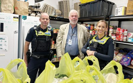SOUTHERN Peninsula Community Support centre director Jeremy Maxwell with Sergeant Daniel Patton and Senior Constable Melissa Daly, of Rosebud police. Picture: Supplied