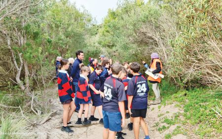 Outdoor lessons: Rye Primary School grade six students and school principal Lachie Featherstone with ecologist Gidja Walker. Picture: Supplied