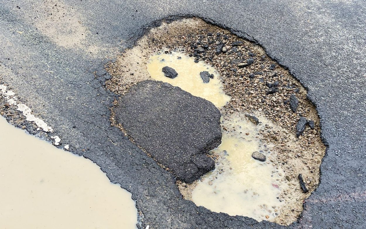 Multiple cars damaged by pothole